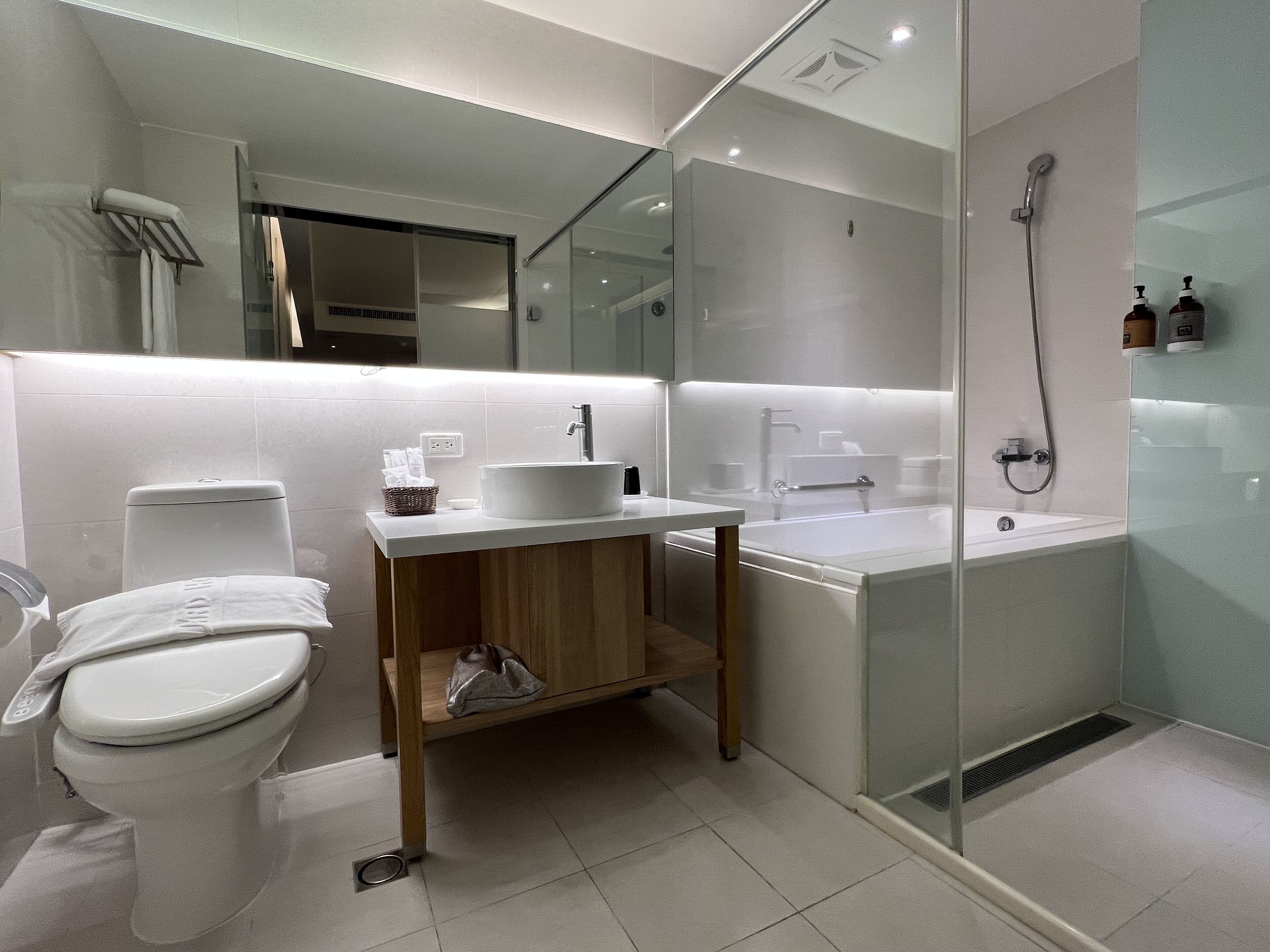 superior twin room | bathroom | eco-friendly toiletries, hair dryer, slippers, electronic bidet