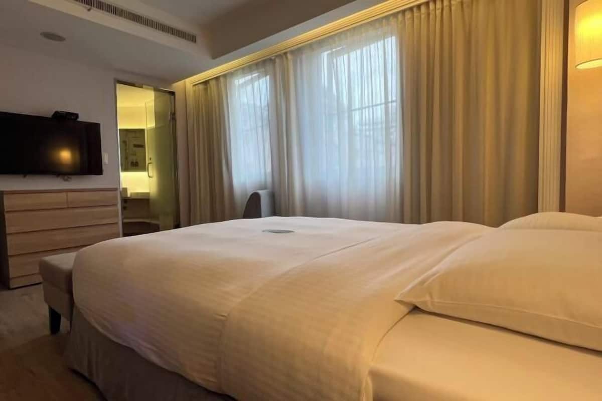 Premium bedding, down comforters, pillowtop beds, minibar