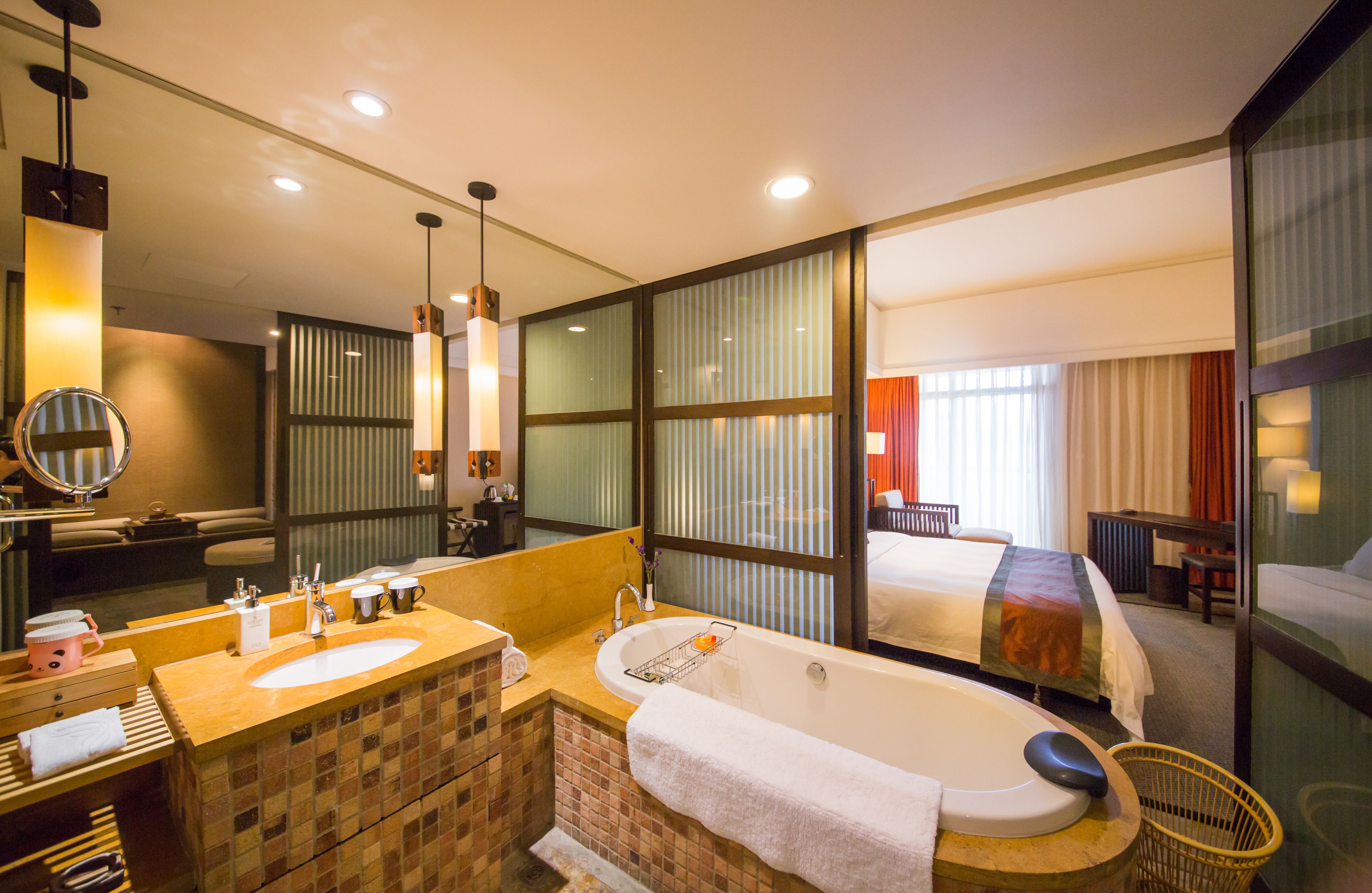 junior suite, lake view | bathroom | hair dryer, bathrobes, towels