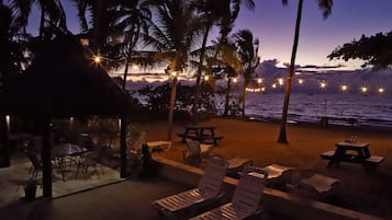 On the beach, sun-loungers, beach umbrellas, beach towels