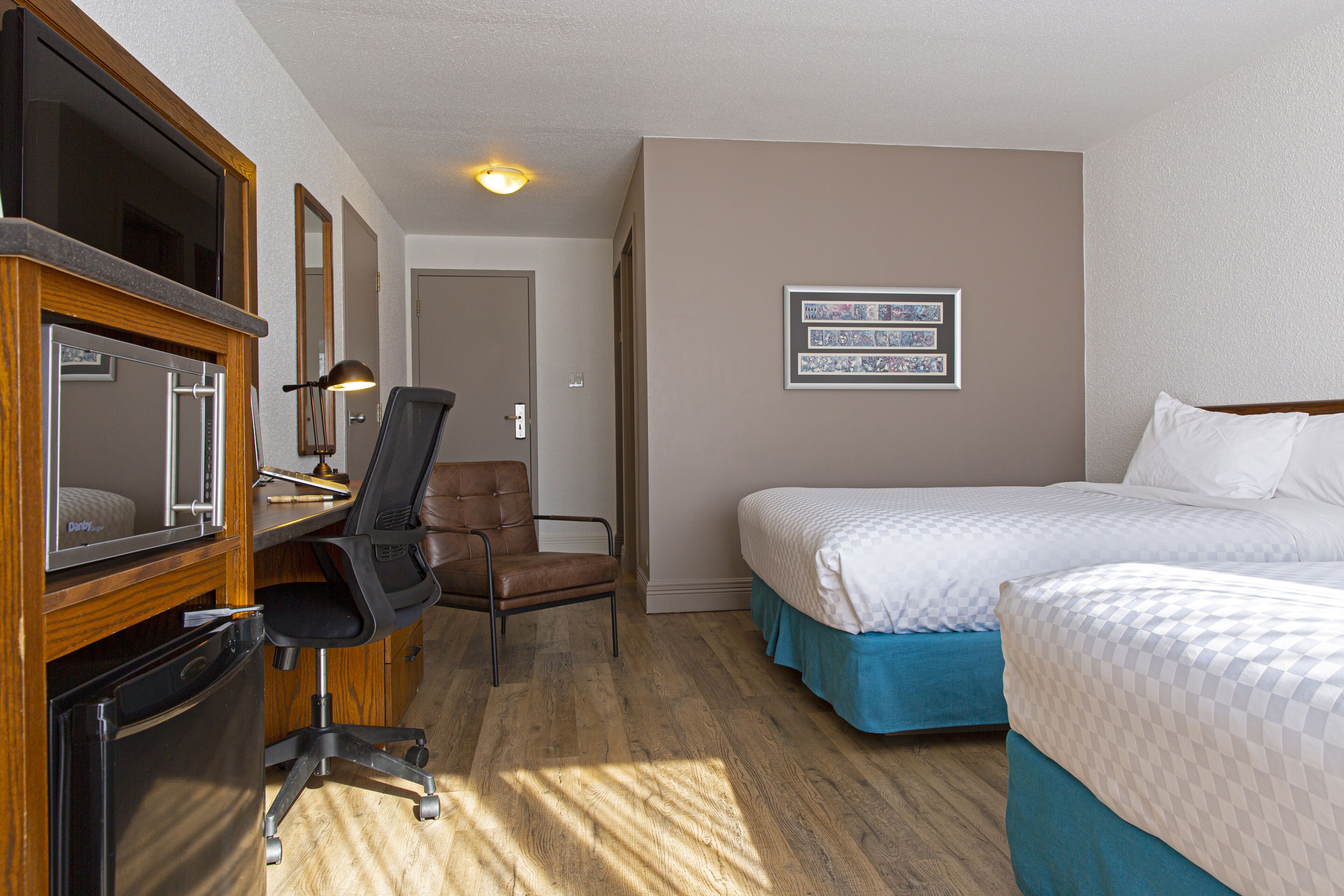 individually decorated, individually furnished, desk, blackout curtains