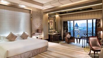 Premium bedding, down comforters, free minibar items, in-room safe