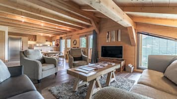 Suite (Leutaz) | Living area | LCD TV, DVD player, iPod dock