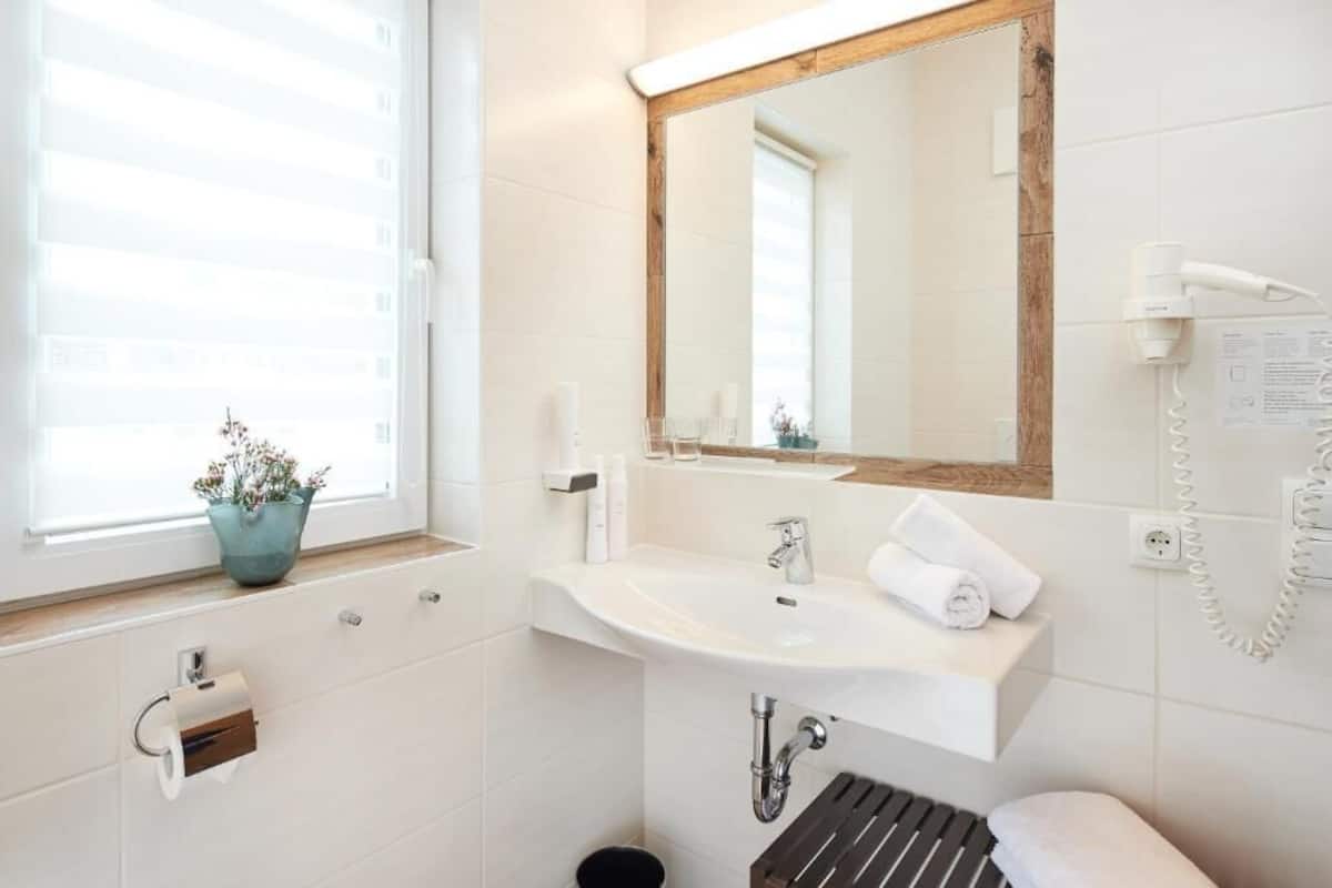 shower, free toiletries, hair dryer, bathrobes