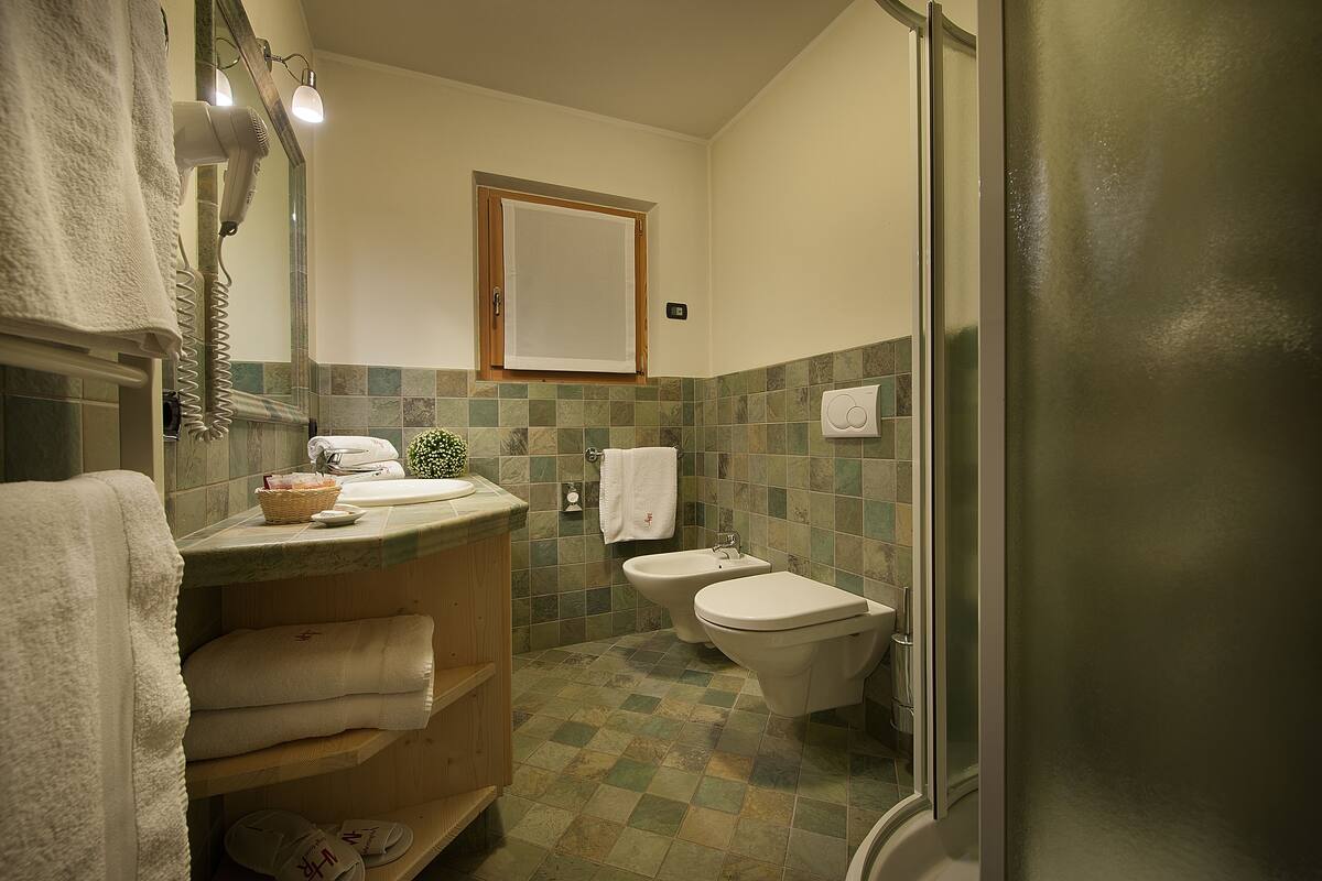 junior suite, balcony | bathroom | shower, free toiletries, hair dryer, bathrobes