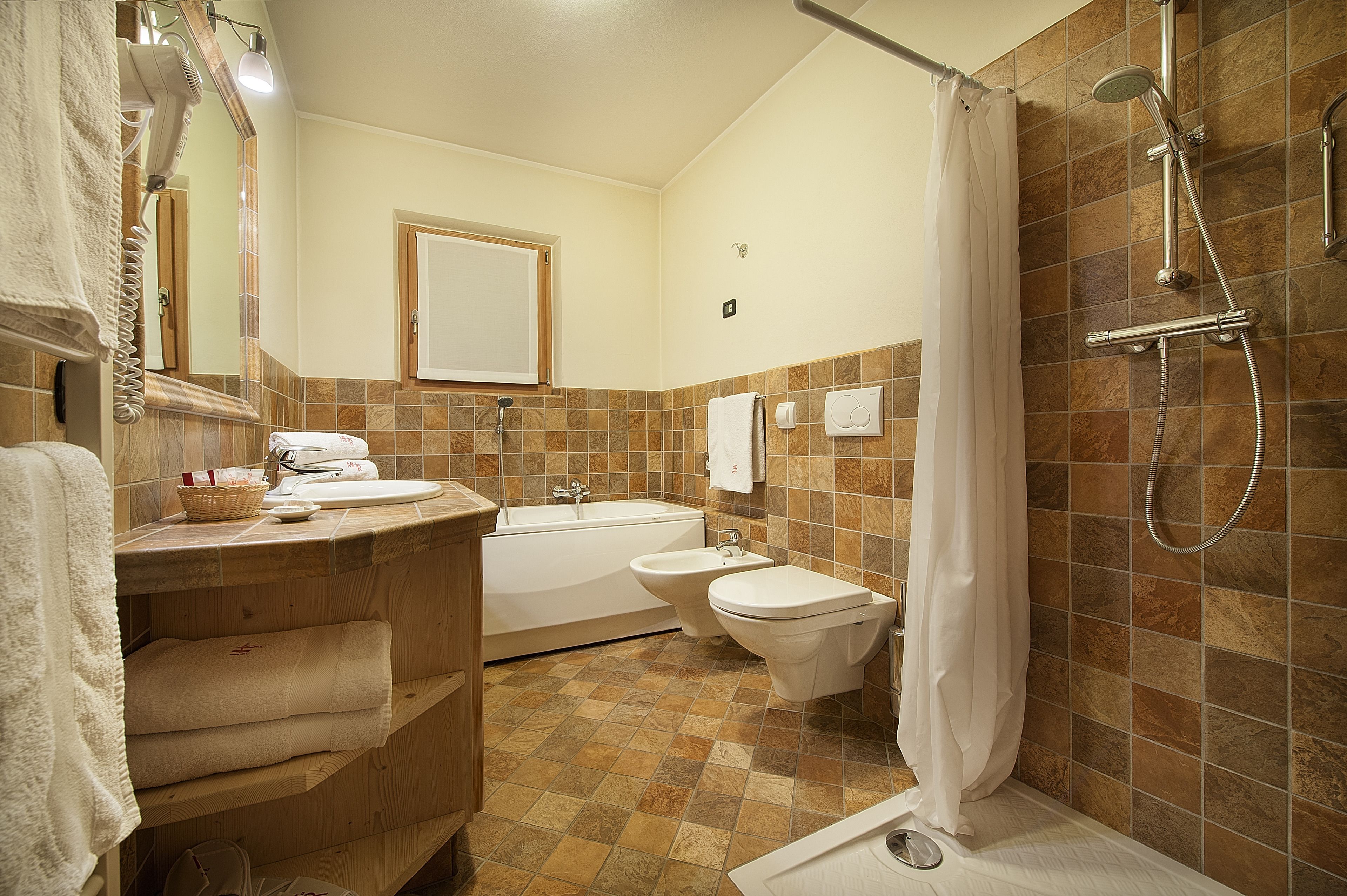 family suite, 2 bathrooms | bathroom | shower, free toiletries, hair dryer, bathrobes