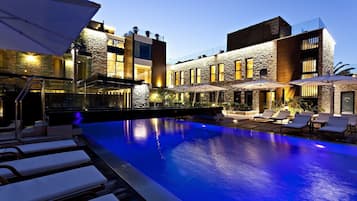 2 outdoor pools, open 7:00 AM to 11:00 PM, pool loungers