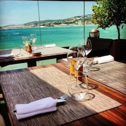 Lunch, dinner served; Mediterranean cuisine, beach views