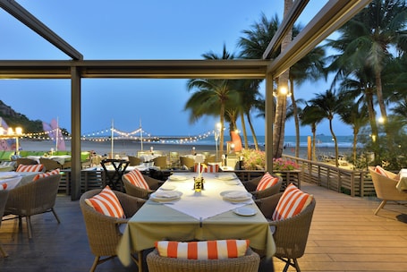 Breakfast, lunch, dinner served; international cuisine, beach views