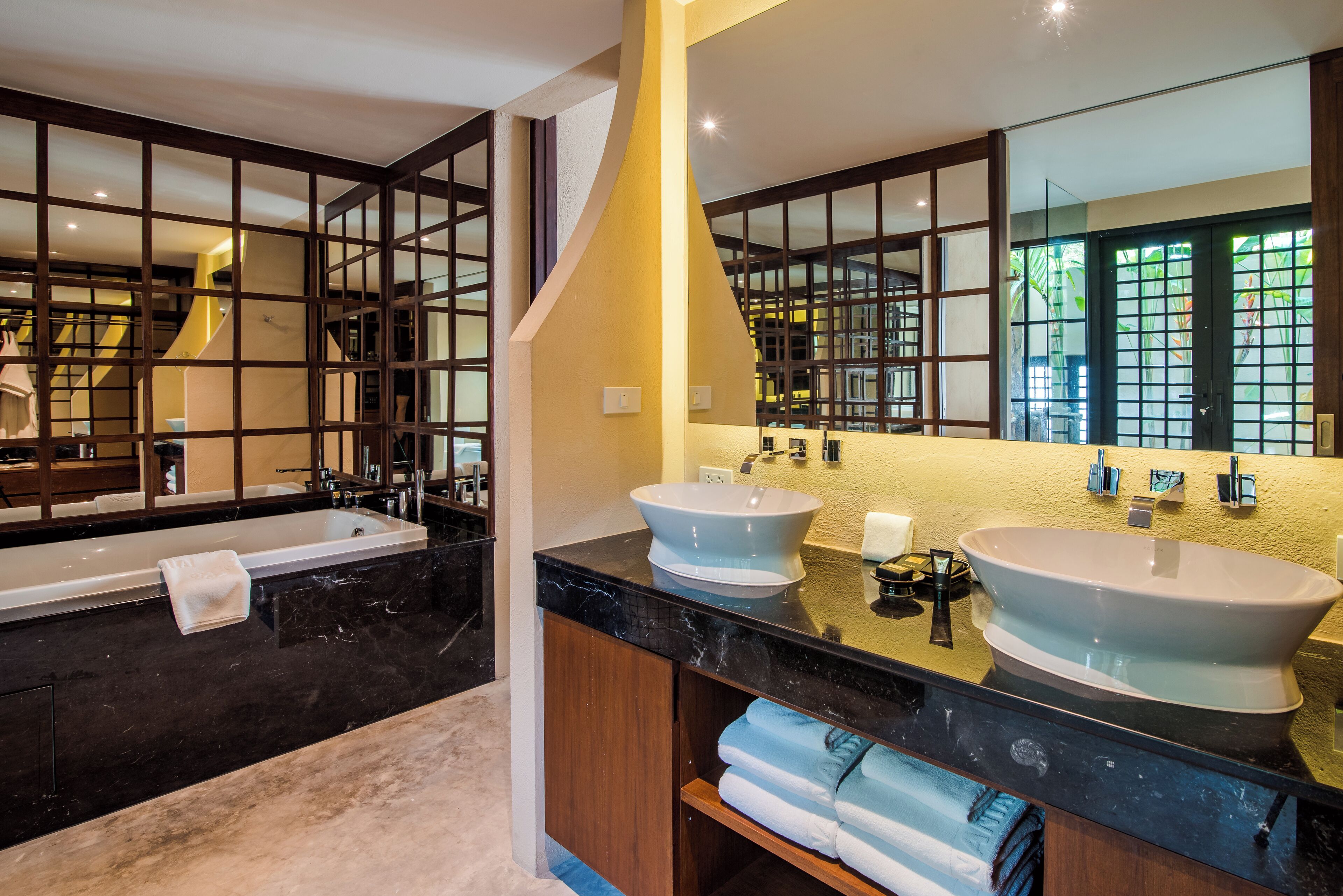 luxury two bedroom pool villa | bathroom | free toiletries, hair dryer, bathrobes, slippers