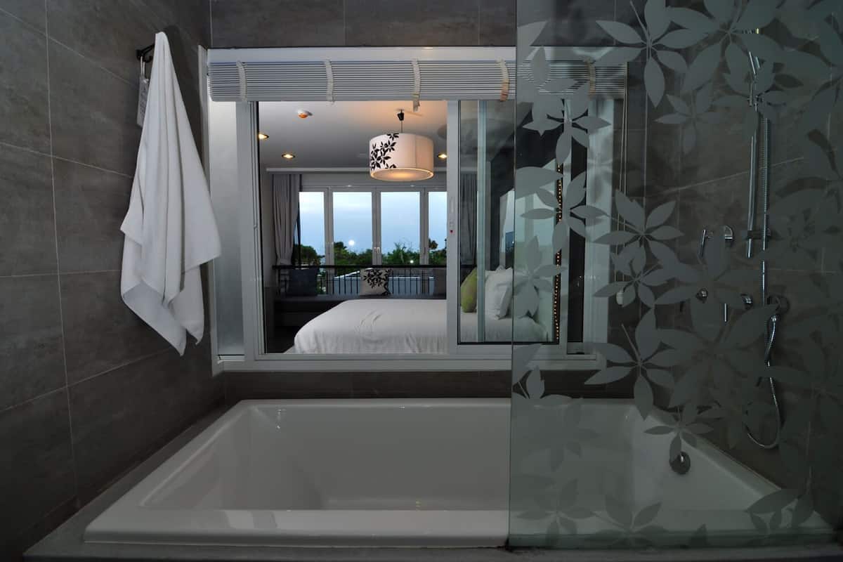 Sea View (Partial) | Premium bedding, minibar, in-room safe, individually decorated