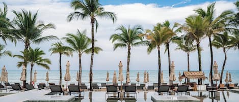 Outdoor pool, pool umbrellas, sun loungers