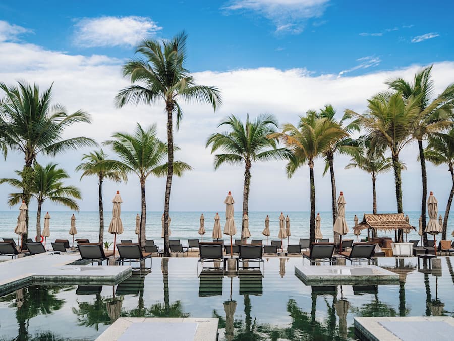 Outdoor pool, pool umbrellas, sun loungers