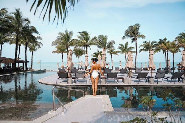 Outdoor pool, pool umbrellas, pool loungers