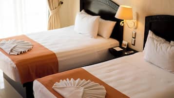 Chambre Standard, 2 lits doubles | Coffres-forts dans les chambres, rideaux occultants