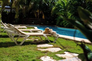 Outdoor pool, open 10:00 AM to 9:00 PM, free pool cabanas