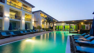 Outdoor pool, open 9:00 AM to 6:00 PM, pool umbrellas, pool loungers