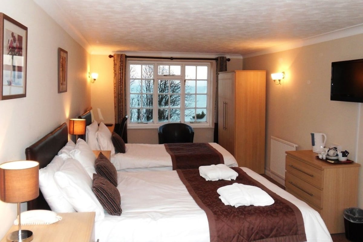 In-room safe, desk, iron/ironing board (on request), cribs (surcharge)