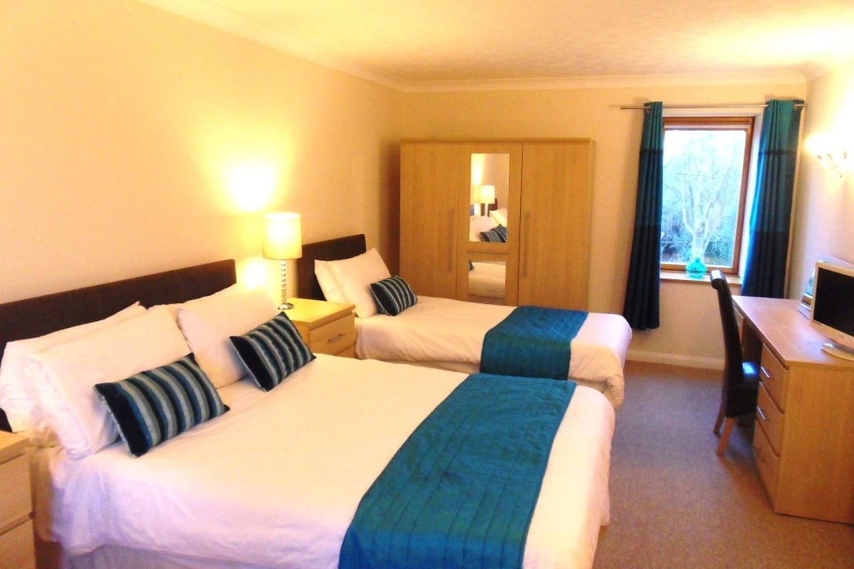 In-room safe, desk, iron/ironing board (on request), cribs (surcharge)