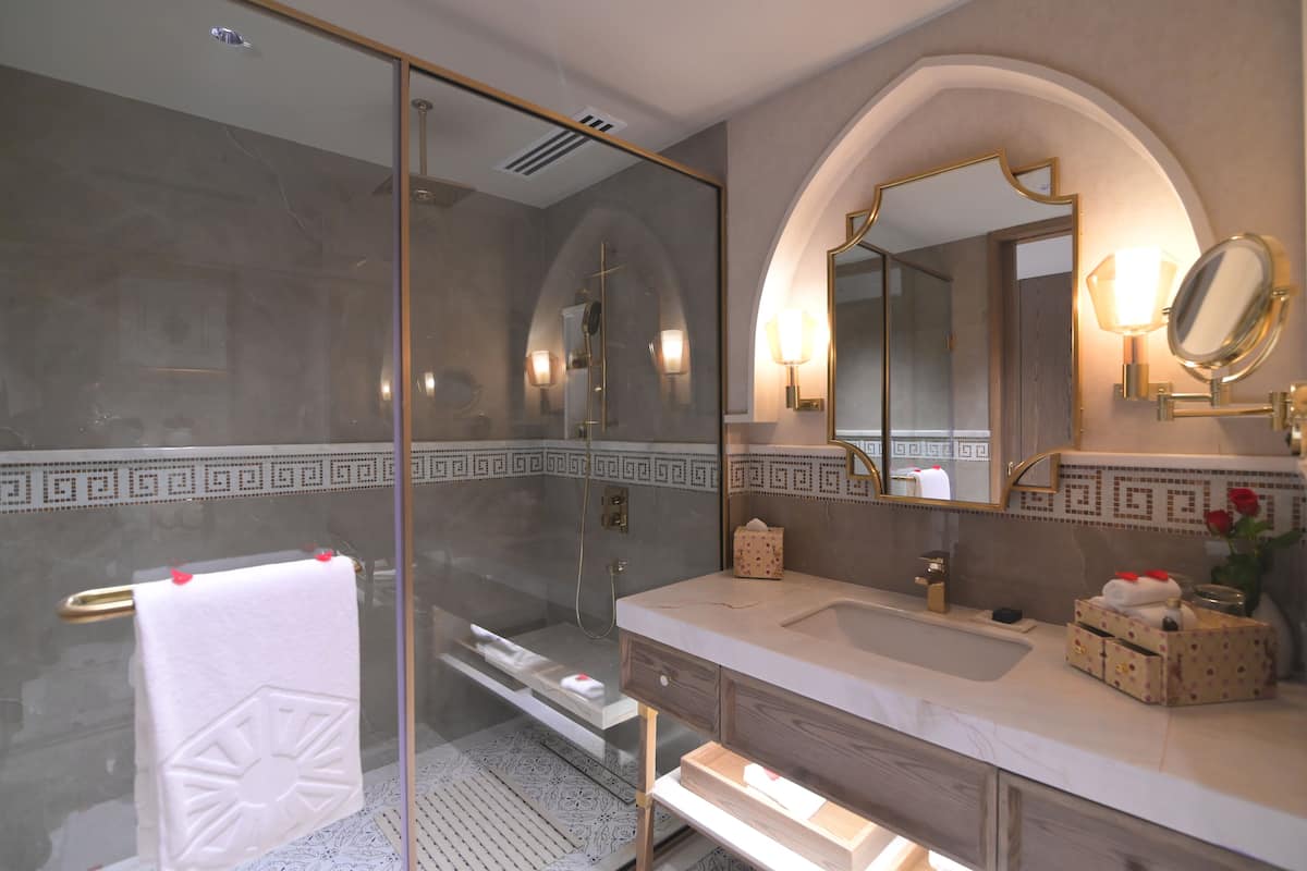 luxury room, 1 king bed | bathroom | free toiletries, hair dryer, bathrobes, slippers