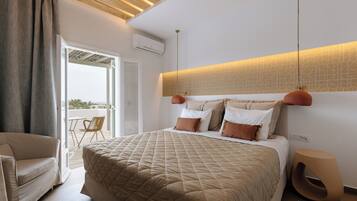 Quarto premium, vista para o mar | Frigobar, cofres nos quartos, Wi-Fi de cortesia, roupa de cama