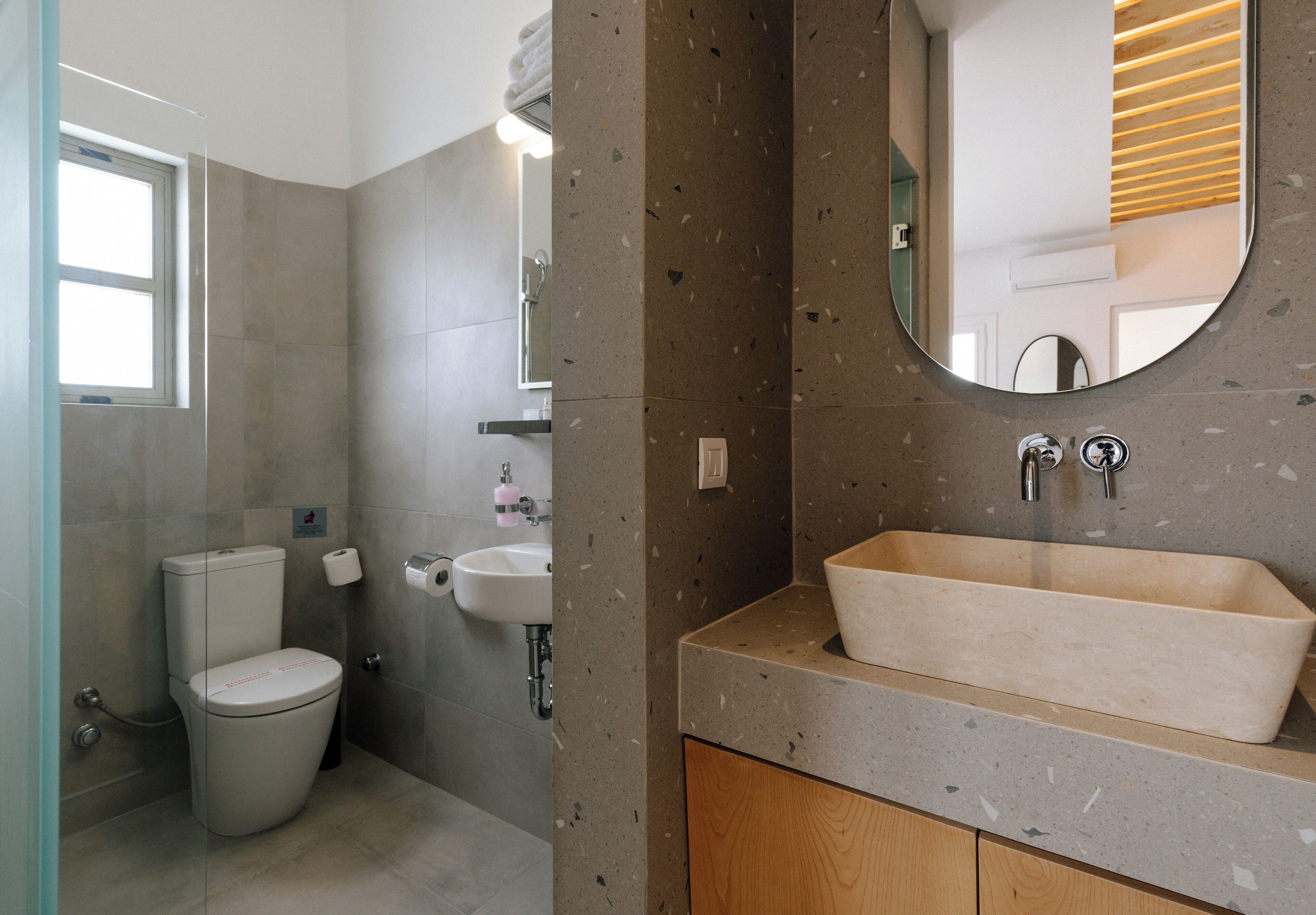 junior suite, sea view | bathroom | shower, free toiletries, hair dryer, slippers