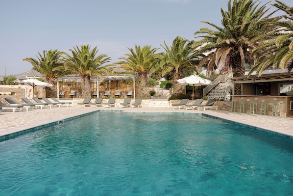 Outdoor pool, pool umbrellas, pool loungers