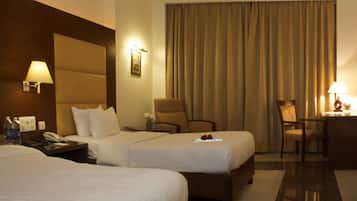 Ropa de cama de alta calidad, minibar, caja fuerte y escritorio