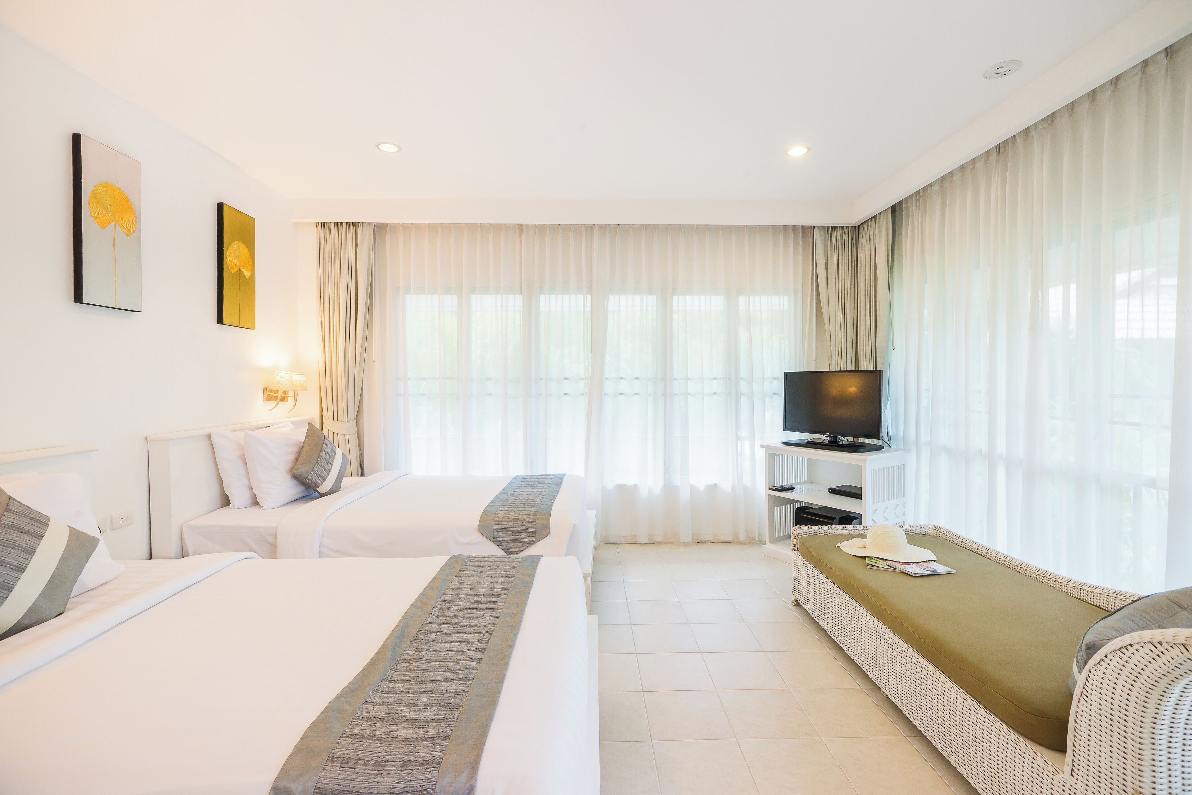 garden veranda, 2 twin beds | premium bedding, in-room safe, individually decorated, blackout curtains