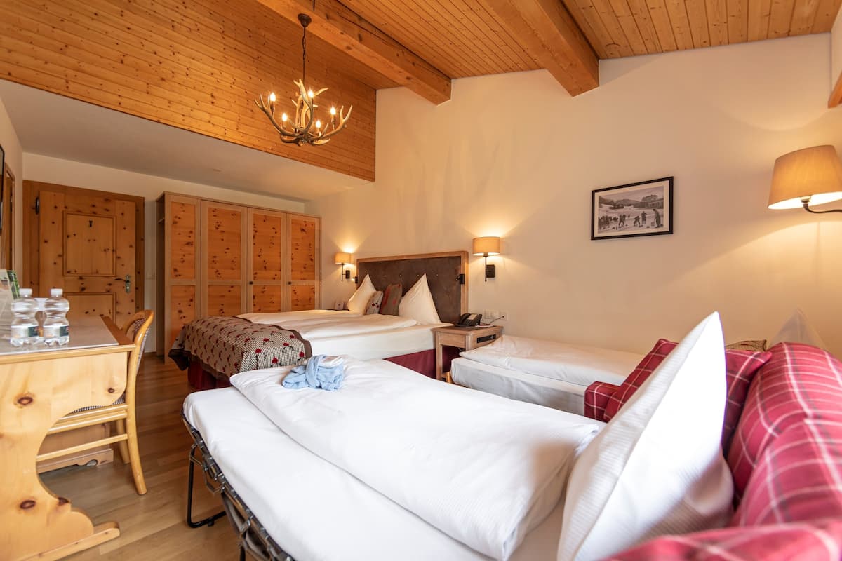Triple Room, Multiple Beds | Hypo-allergenic bedding, minibar, in-room safe, individually decorated