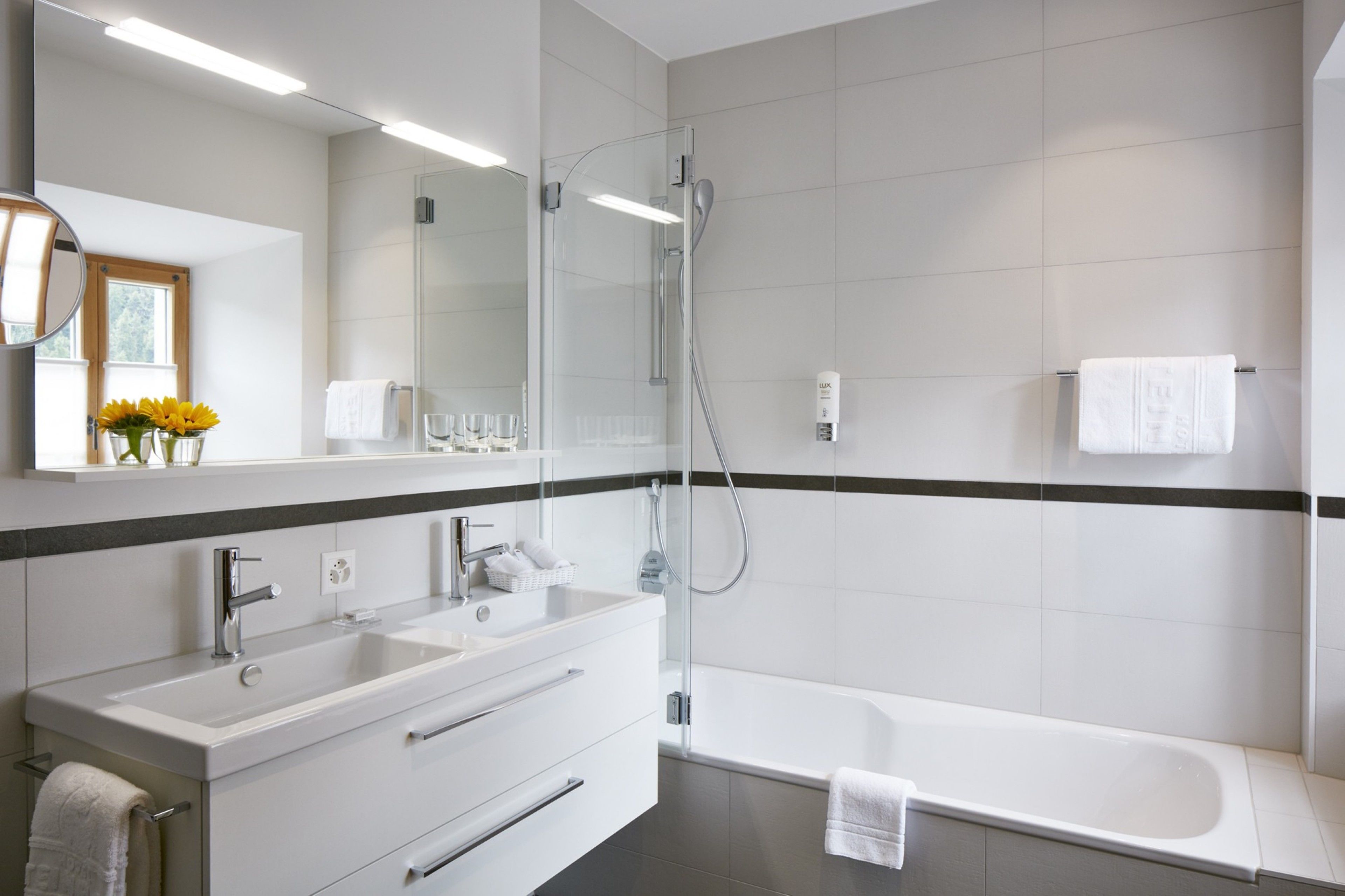 hair dryer, bathrobes, slippers, towels