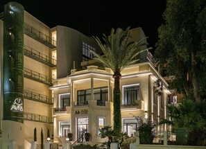 A multi-story hotel with a prominent sign reading "AVRA CITY HOTEL". - Avra City Boutique Hotel (Chania)