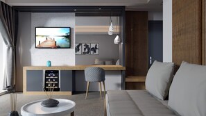 Suite Luxe, piscine privée, vue mer | Salle de séjour | Télévision LED de 49 pouces avec chaßnes par satellite, télévision