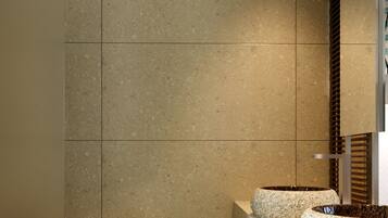 Shower, hair dryer, slippers, towels