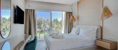 Premium bedding, memory foam beds, minibar, in-room safe