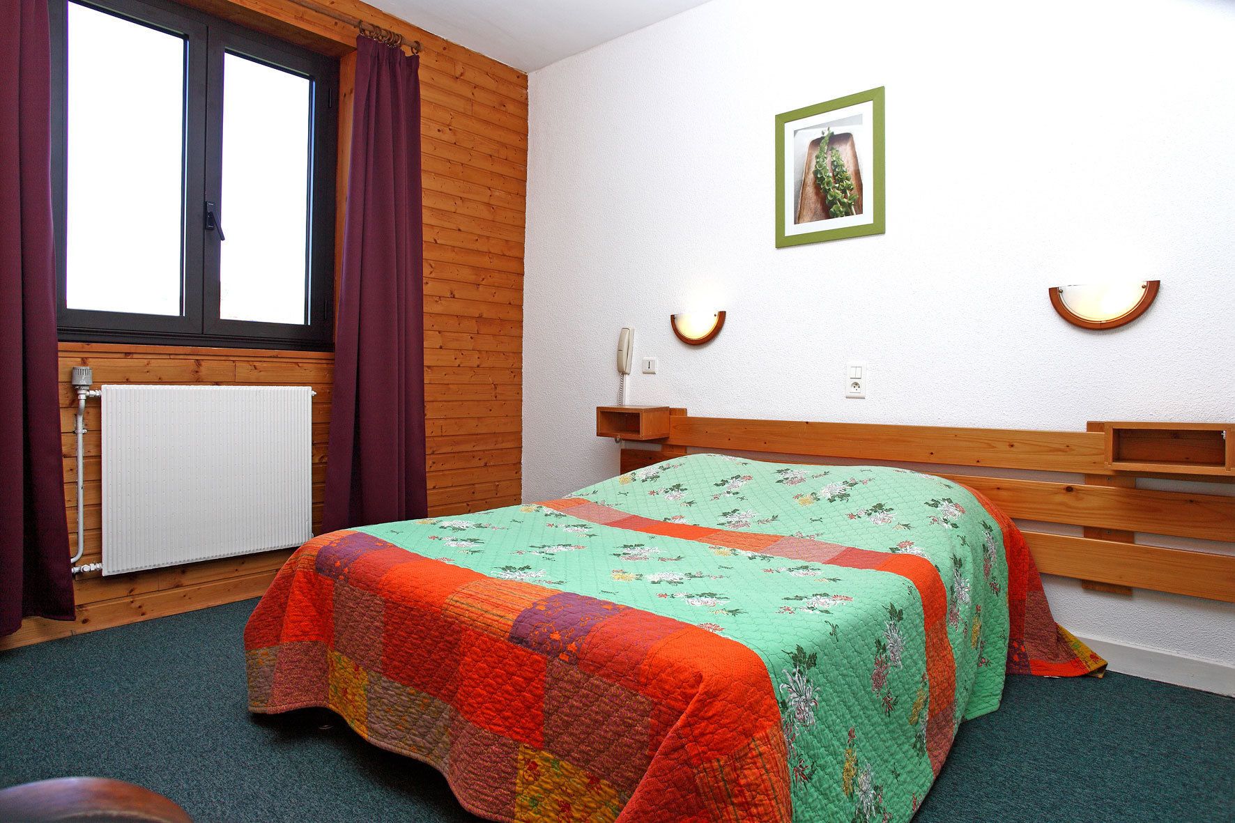 desk, blackout curtains, iron/ironing board, cots/infant beds