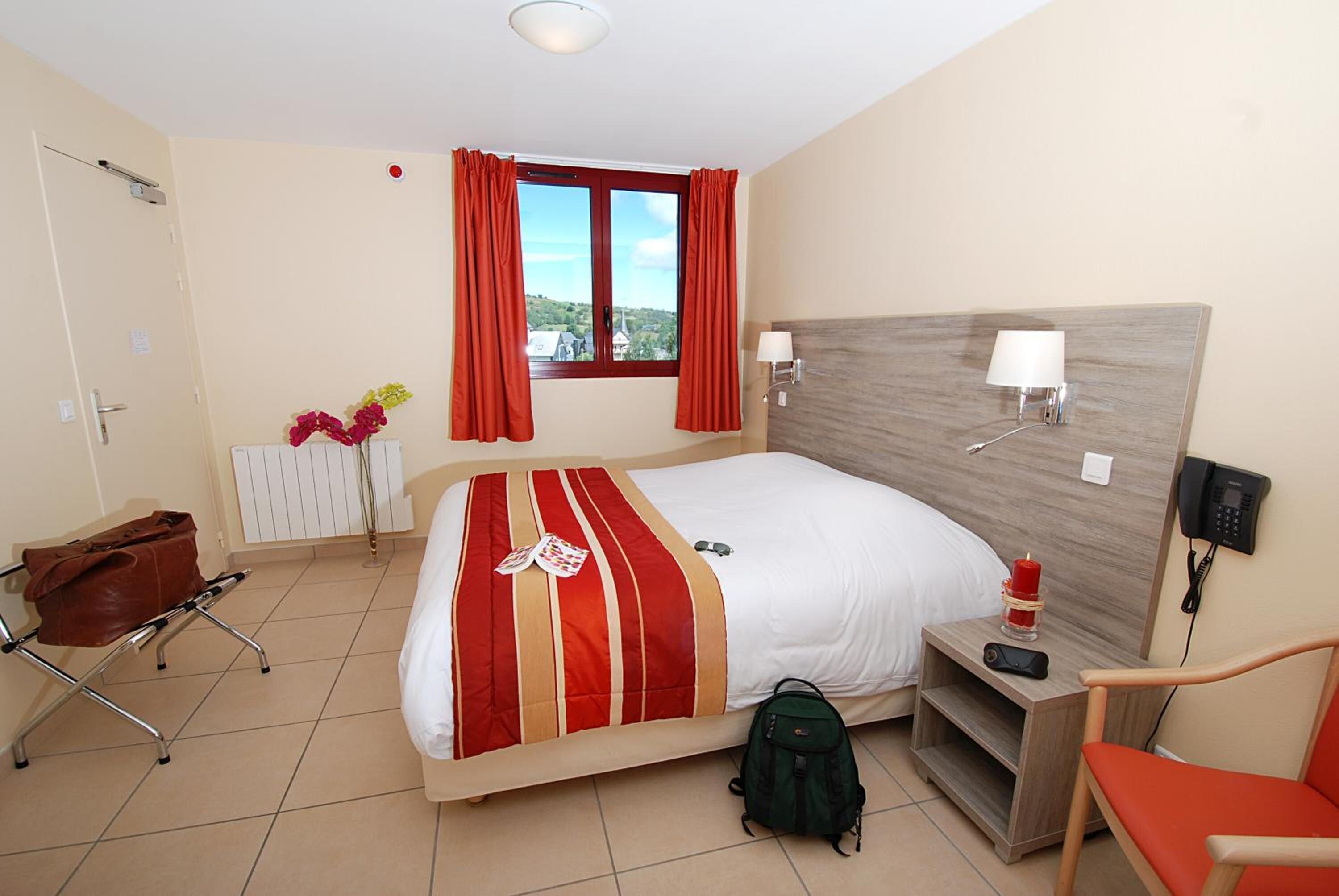 desk, blackout curtains, iron/ironing board, cots/infant beds