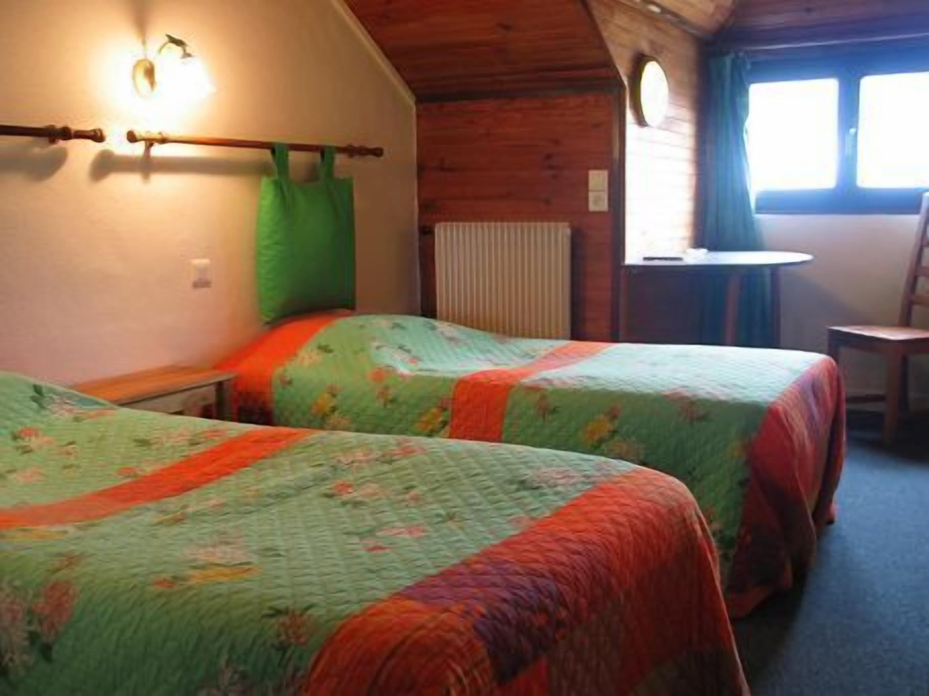 desk, blackout curtains, iron/ironing board, cots/infant beds