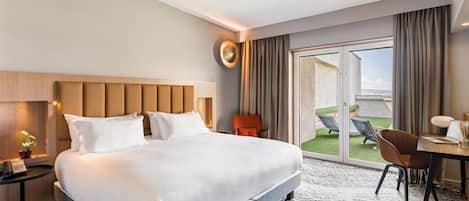 Suite, 1 cama King size, Terraza | Ropa de cama de alta calidad y caja de seguridad en la habitación