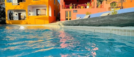 Outdoor pool, open 7:00 AM to 9:00 PM, sun loungers