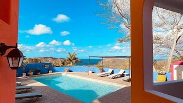 Outdoor pool, open 7:00 AM to 9:00 PM, sun loungers