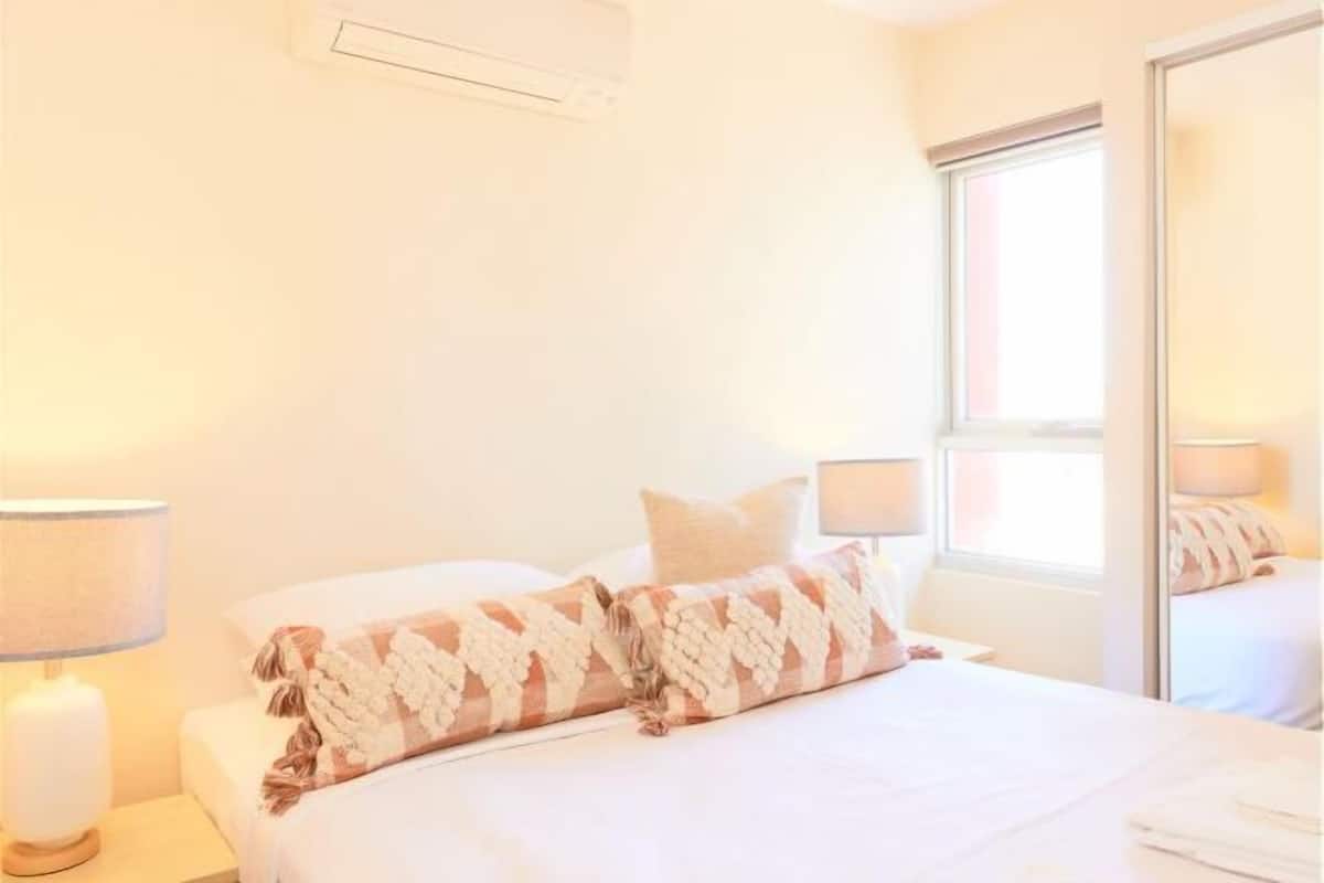 Desk, laptop workspace, blackout curtains, iron/ironing board