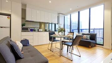 Premium Penthouse Apartment | Living area | 40-inch LCD TV with digital channels, TV