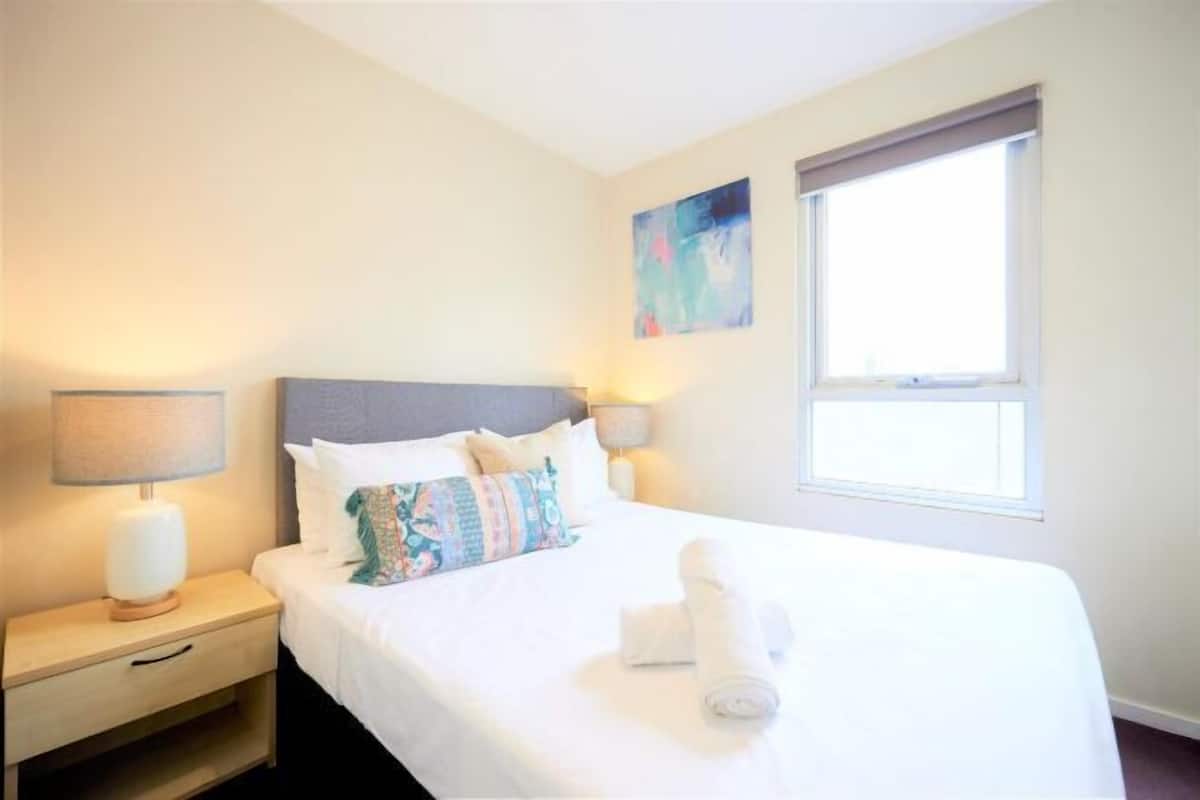 Desk, laptop workspace, blackout curtains, iron/ironing board