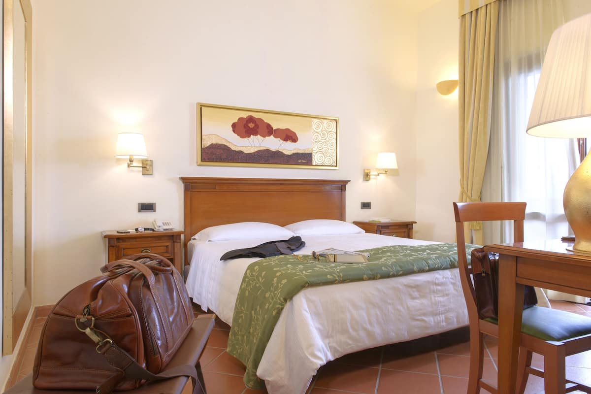 Ropa de cama de alta calidad y minibar