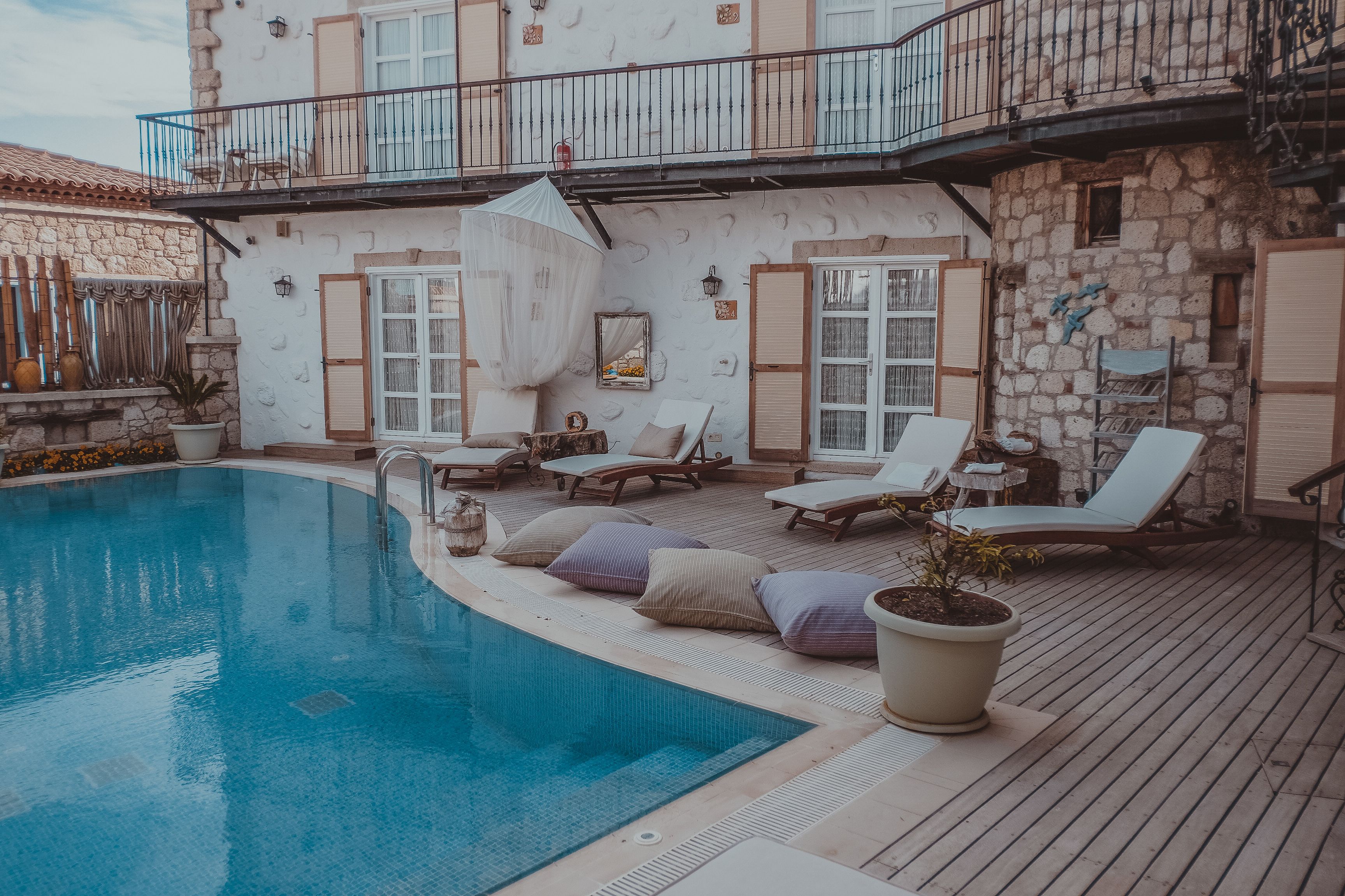 seasonal outdoor pool, pool umbrellas, pool loungers