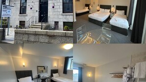 A 2B guest house with stone walls, a staircase, a bed, a desk, and a bathroom. - Lost Guest House - Aberdeen (Aberdeen)