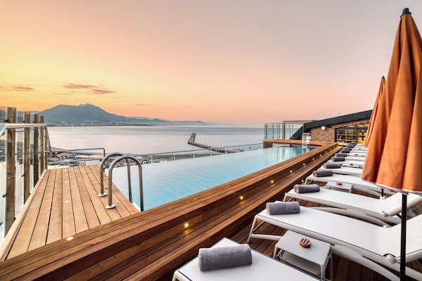 Outdoor pool, open 9:00 AM to 6:00 PM, pool umbrellas, sun loungers