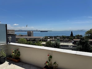 Quadruple Room with Sea View | Terrace/patio