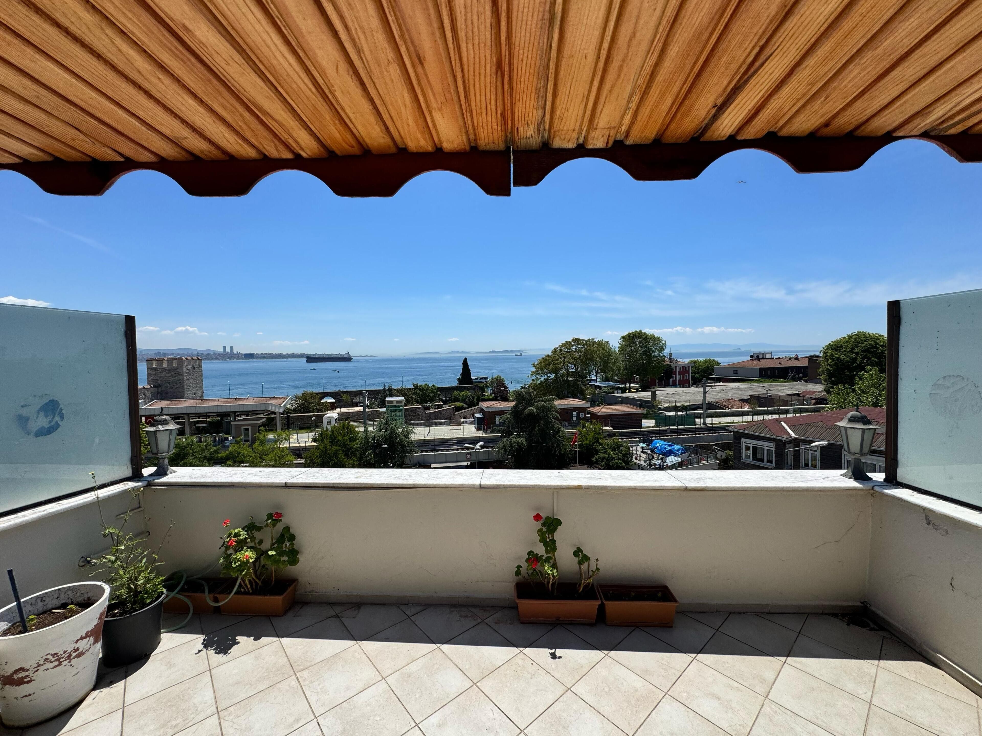 Quadruple Room with Sea View | Terrace/patio